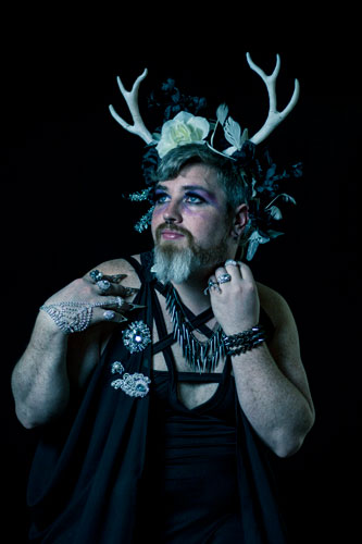 Fantasy Photogrpah of a man in a horned floral headdress.